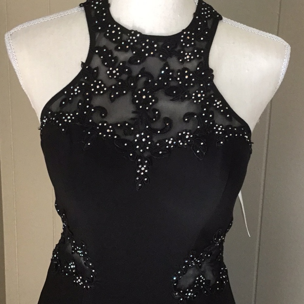 Gorgeous! Sheer sided at waist. Stunning heading/sequin accents. Brand N…